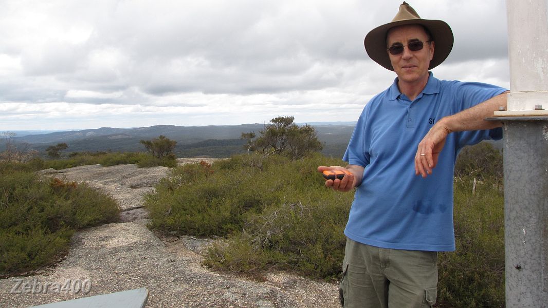 28-Laurie tracks our position with SPOT on top of Bald Rock.JPG